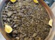 Comer arroz negro en Pinedo